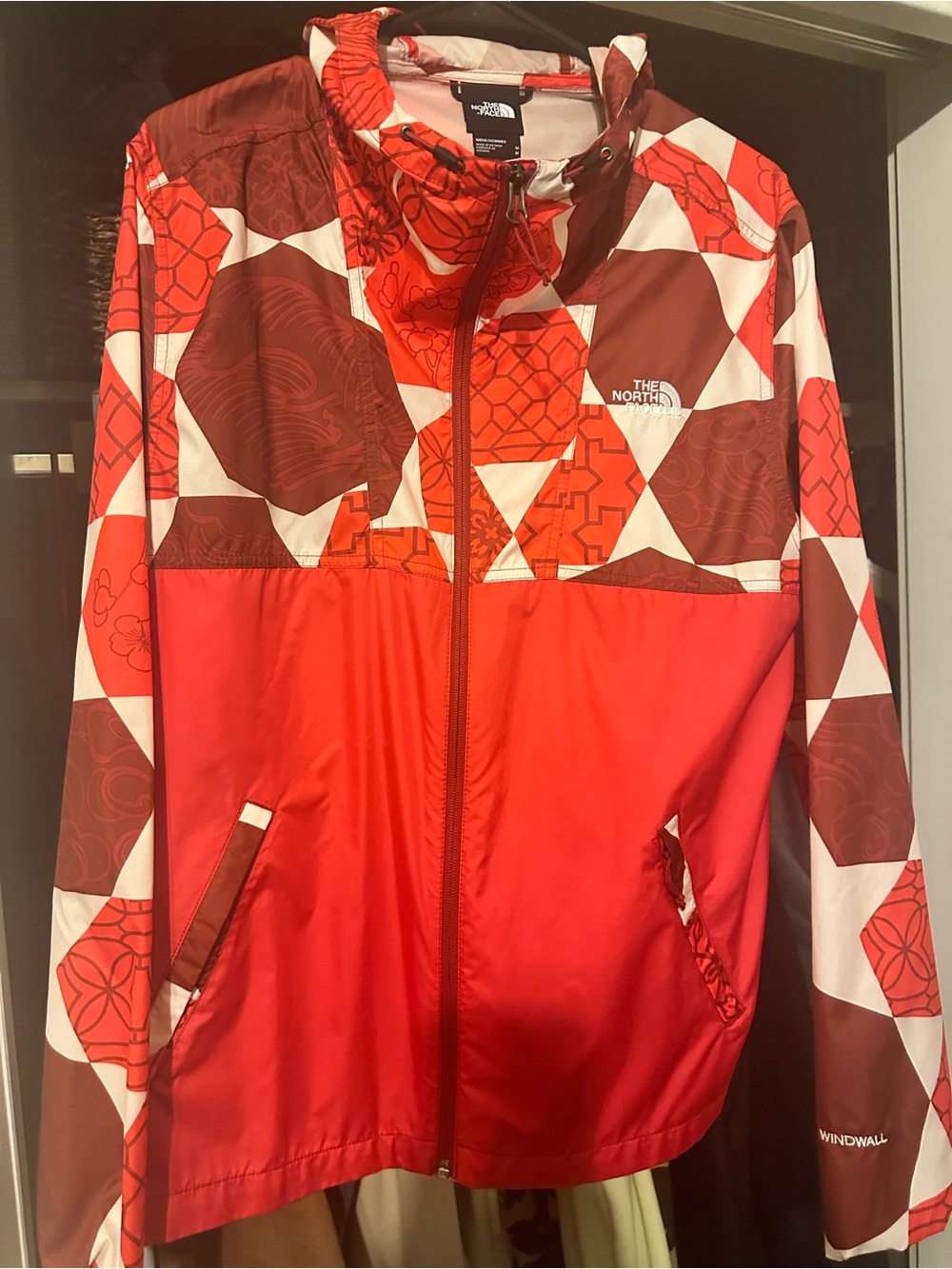 The North Face Red and White Geo Windbreaker Jacket